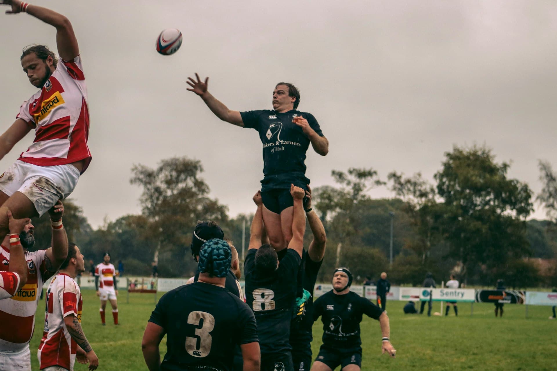 Rugby team line-out at Holt Rugby Club, Norfolk, UK